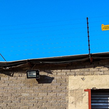 Electric Fence on Roof of Building